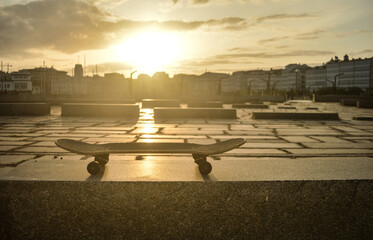 skateboard in a sunset on the street