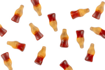 Cola flavored gummy jellies in the shape of cola bottles,isolated over transparent background.