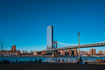 Manhattan Bridge, New York City, in a sunny day, clear blue sky