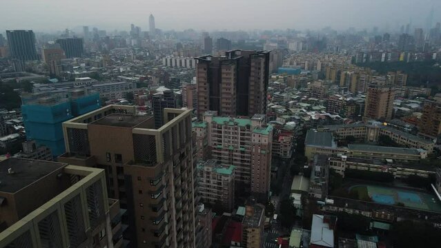 Buildings Shrouded In Smog Seen From Neighborhood Of Wanhua District In Taipei, Taiwan. aerial pullback