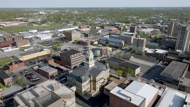 Downtown Lima, Ohio with drone video moving in a circle around court house.