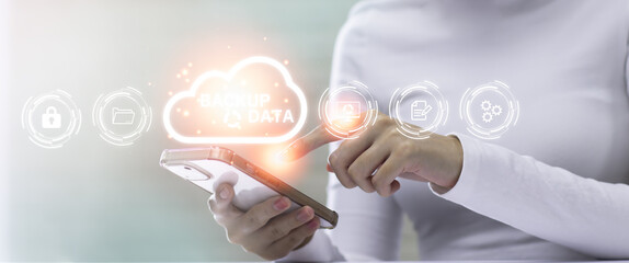 Woman using smartphone connecting with cloud storage big data online. Technology and business concept