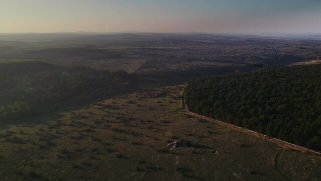 Aerial of the Puglia countryside at sunset in Italy 4K drone