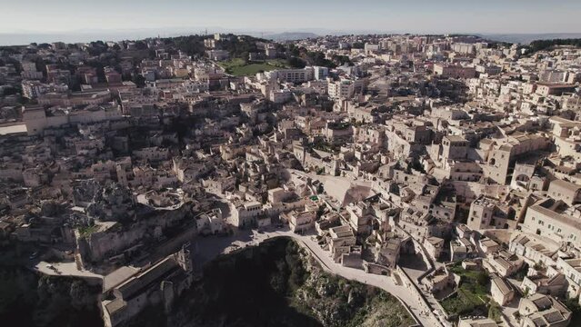 Day aerial over the Ancient Jerusalem looking city of Matera in Basilicata, Italy and its ravine