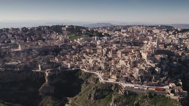 Day aerial over the Ancient Jerusalem looking city of Matera in Basilicata, Italy and its ravine