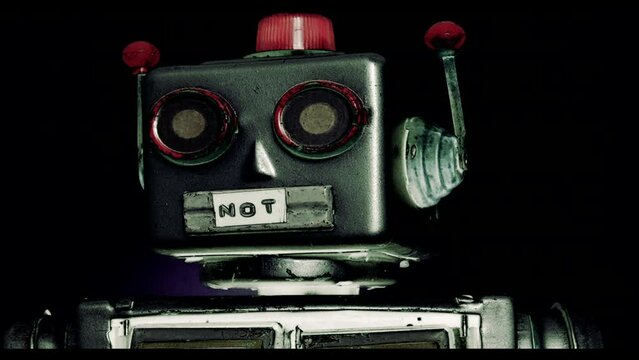 The retro tin robot toy says I AM NOT A ROBOT .stop motion 