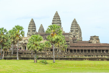 Fototapeta premium The towers of Angkor Wat Cambodia. Angkor Thom khmer temple. Travel landmark, copy space for text