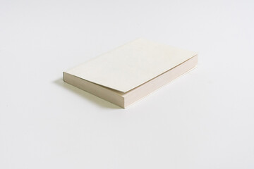 Blank book cover over white background