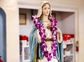 Mother Mary with lei
