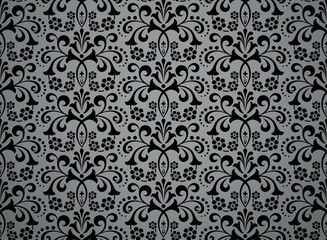Wallpaper in the style of Baroque. Seamless vector background. Black and gray floral ornament. Graphic pattern for fabric, wallpaper, packaging. Ornate Damask flower ornament