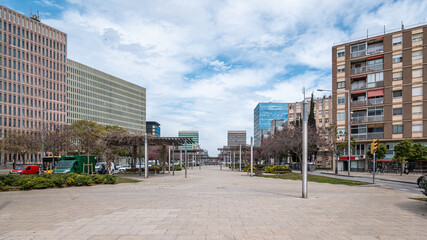 Fototapeta na wymiar New building urban area and convenient infrastructure for people in a modern European city on summer cloudy day. Comfortable space concept. Copyspace