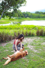  woman playing with her dogs at park Lifestyle and friendship