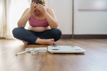 Obese Woman with fat upset about her belly. Overweight woman touching his fat belly and want to...