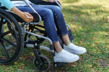 Obraz premium Depressed sad asian woman in wheelchair&nbsp;lonely disabled adult