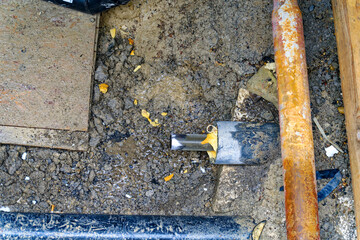 Close-up of pipe at repair site of district heating at City of Zürich district Schwamendingen on a...
