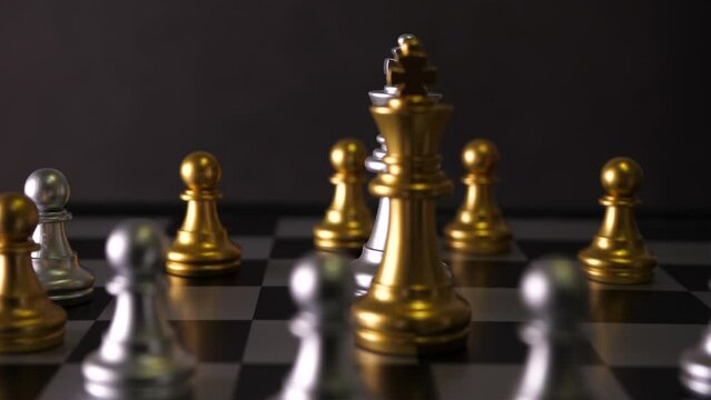 Cinematic shot of king chess pieces on a chess board, rotating view of yellow and white figures, chess playing concept.