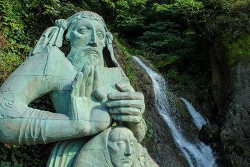 Batumi, Georgia - August 2nd, 2019: Close up on the statue of the John the baptist next to the sacred spring in Adjara, Georgia, Batumi region, horizontal image