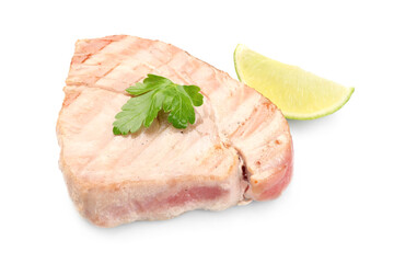 Delicious tuna steak with parsley and lime isolated on white