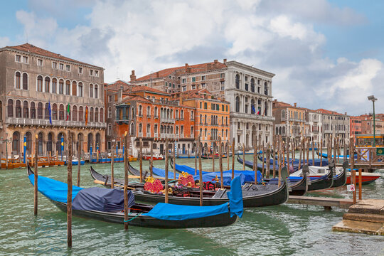 Row of gondolas on the Grand Canal in Venice