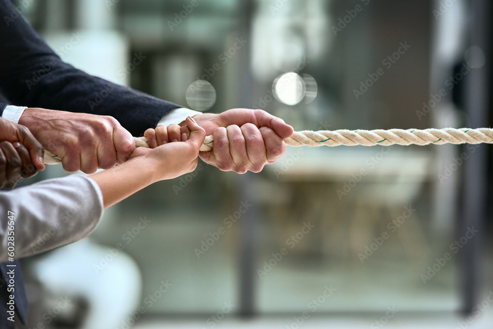Poster hands, teamwork and rope with business people pulling during a game of tug of war in the office. col