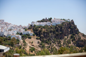 Fototapeta na wymiar White Houses on a Hillside in Casares Spain