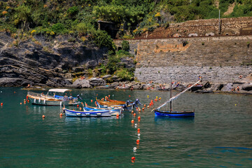 Colorful boats on the Mediterranean Sea in Cinque Terre, Vernazza, Italy