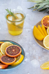A glass of iced tea with fresh fruit