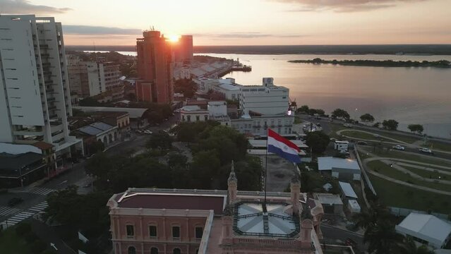 Aerial Drone Fly Above Presidential Palace in Asuncion Paraguay Water River View During Sunset, Cinematic Panorama
