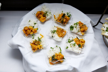 A top down view of a catered platter of shrimp gumbo.