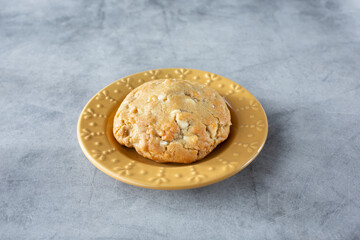 A view of a macadamia nut cookie.