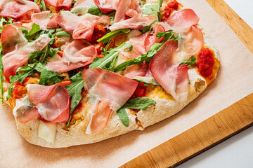 roman pizza on the wooden tray