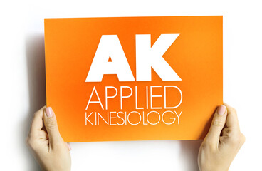 AK - Applied Kinesiology is a pseudoscience-based technique in alternative medicine claimed to be able to diagnose illness or choose treatment, acronym text concept on card