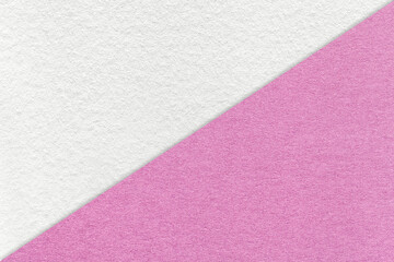 Fototapeta na wymiar Texture of craft white and lilac paper background, half two colors, macro. Vintage dense kraft pink cardboard.