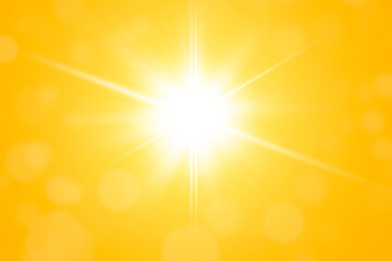 Sunny abstract background. Sun rays and bokeh on orange background