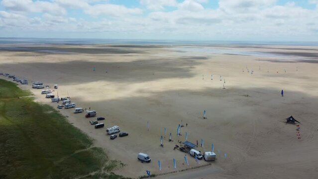 Aerial overview of blokarts racing across sonderstrand beach, Denmark