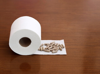 Pills against constipation. Gut health. Fecal transplant. 