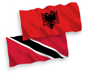 Flags of Republic of Trinidad and Tobago and Albania on a white background