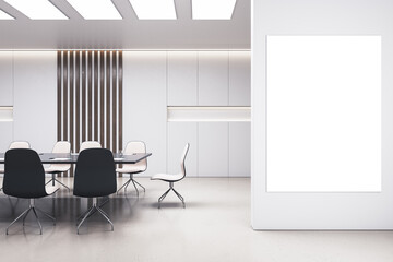Front view on blank poster for advertising text or logo on light partition in modern meeting room interior design with white decorated wall, glossy floor and stylish furniture. 3D rendering, mockup