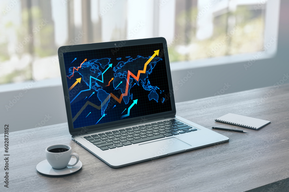 Poster close up of laptop on wooden office desktop with coffee cup and growing arrows and map on screen. bl