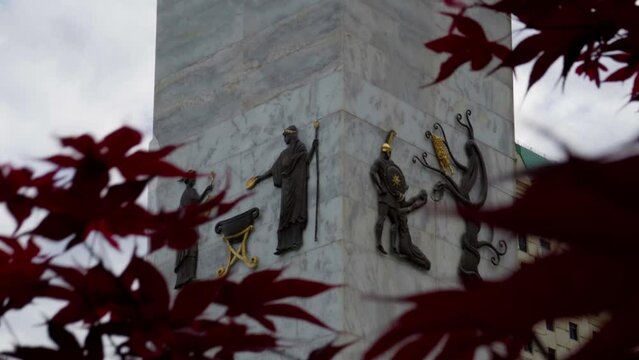 Batumi, Georgia &ndash; May 6, 2023: Column decorations of Statue of Medea erected in Batumi, Georgia. Fragments from the myth that tells about the journey of the Argonauts for the Golden Fleece.
