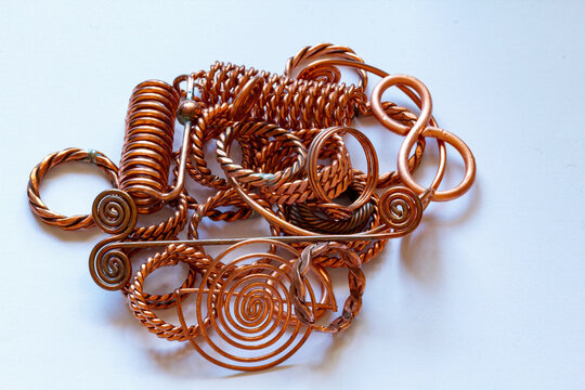 Copper jewellery helps with wrist pain relief - stock photo