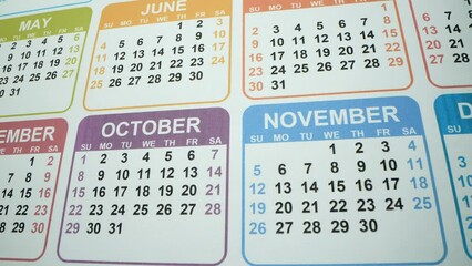 Calendar month macro. Many dates with holidays and businessdays. December, November, October, May, Janyary 2023. Halloween, Christmas Happy new year. New possibilities concept. Fast, And New Days Are
