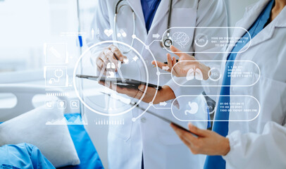 Hospital Ward. Doctor Talks With Professional Head Nurse or Surgeon, They Use Digital tablet Computer. Diverse Team of Health Care Specialists Discussing Test Result in hospital with virtual icon