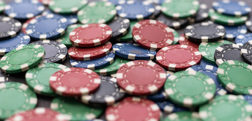 Plastic casino chips background. Poker game