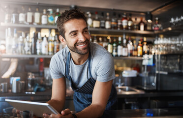 Smile, thinking and a barista with a tablet at a cafe for online orders and communication. Happy,...
