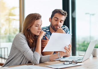 Planning, budget and couple with finance documents for tax, bills and savings on laptop with...