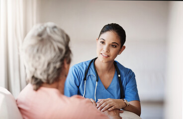 Support, healthcare and nurse with a senior patient explaining a diagnosis after consultation. Medical, empathy and female caretaker volunteer consoling an elderly lady in retirement at nursing home. - obrazy, fototapety, plakaty