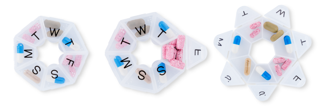 Set of colorful capsule pills in plastic box. Pharmaceutical industry. Healthcare and medicine. Vitamins and supplements concept.