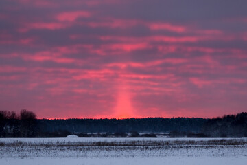 Naklejka premium winter evening at countryside