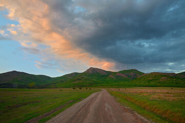 Road in Macin Mountains, Romania at Sunset